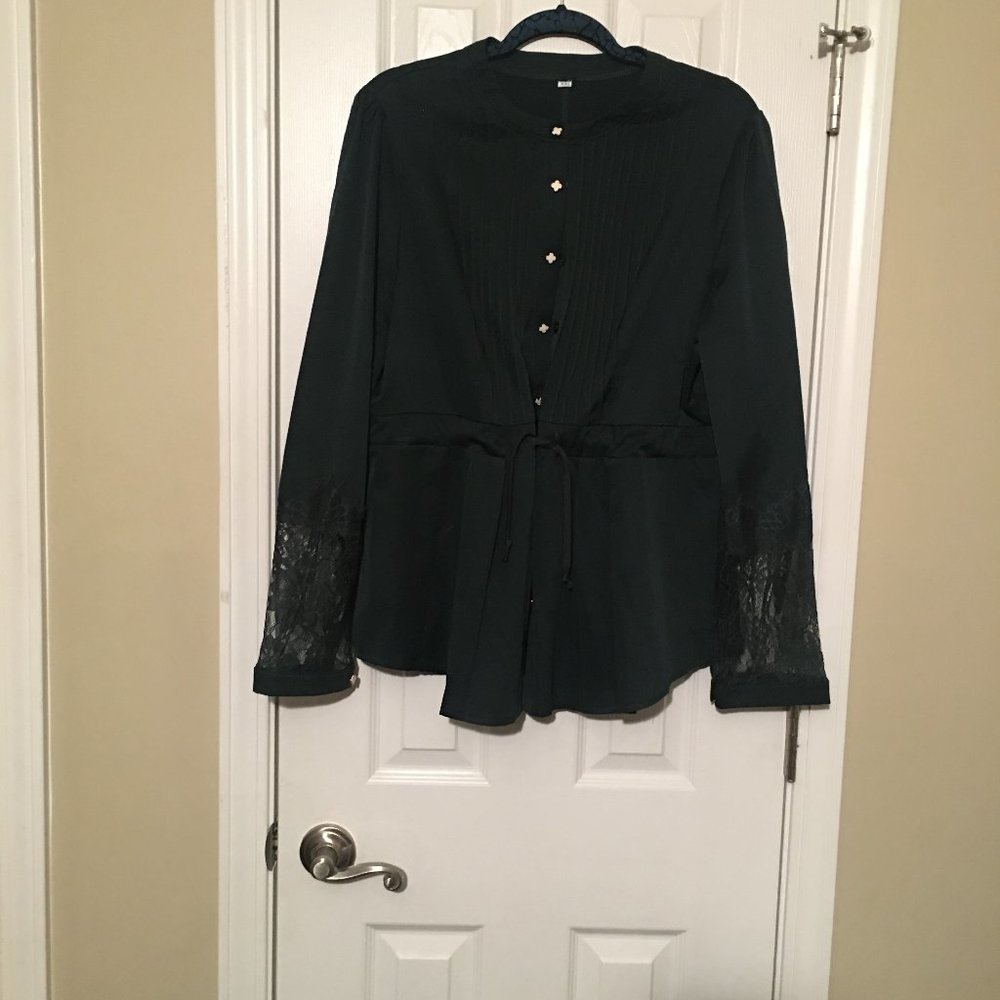 Peplum blouse with laced arms
